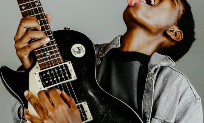 man playing the guitar
